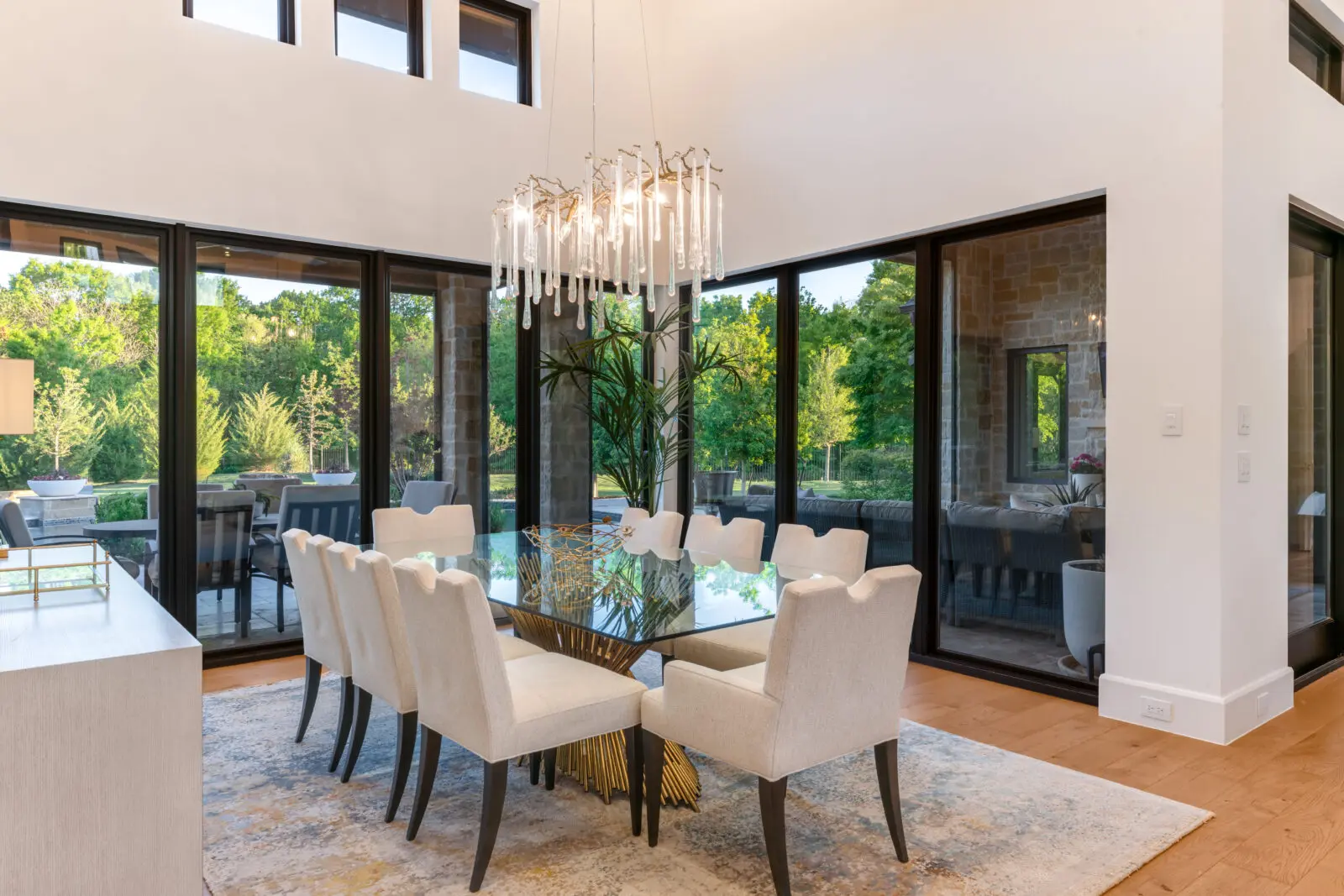 Entertain in the dining room with a spectacular view of the backyard. (Photo by Costa Christ / Compass)
