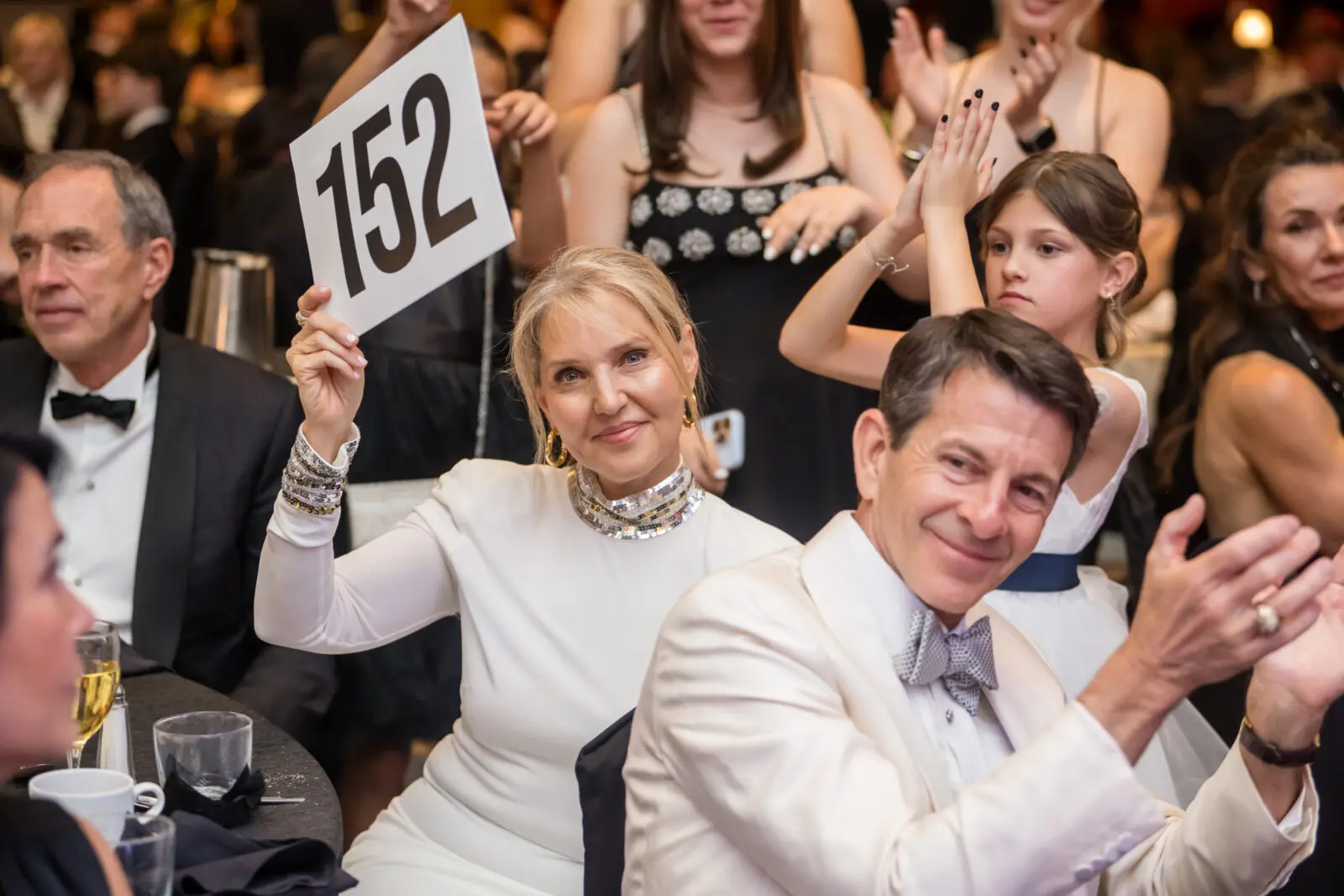 Amber & Clay Bretches bidding at the Breakthrough T1D (formerly JDRF) gala (PHoto by CJ Martinez)