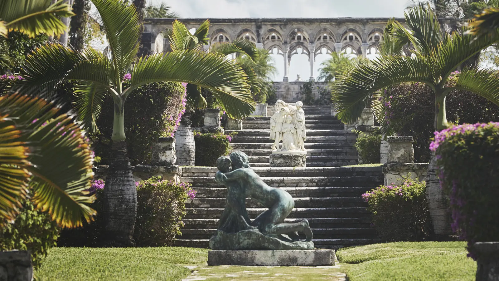 The Versailles Gardens, built by founder Huntington Hartford and still among the most extraordinary outdoor spaces in the Caribbean, cascade toward the sea in seven terraced levels.