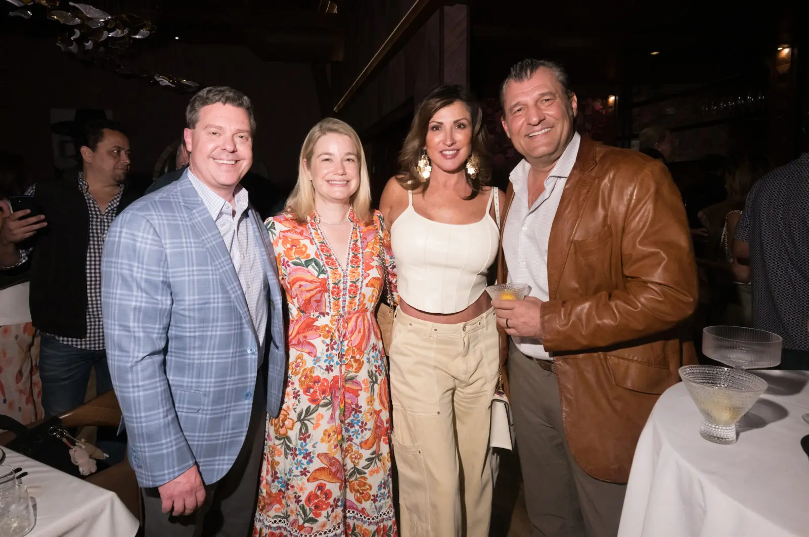 Craig & Sarah Stanfield, Nellie Gonzalez, John Happ at the opening party for Exilio Latin restaurant in Harlow District (Photo by Daniel Ortiz)