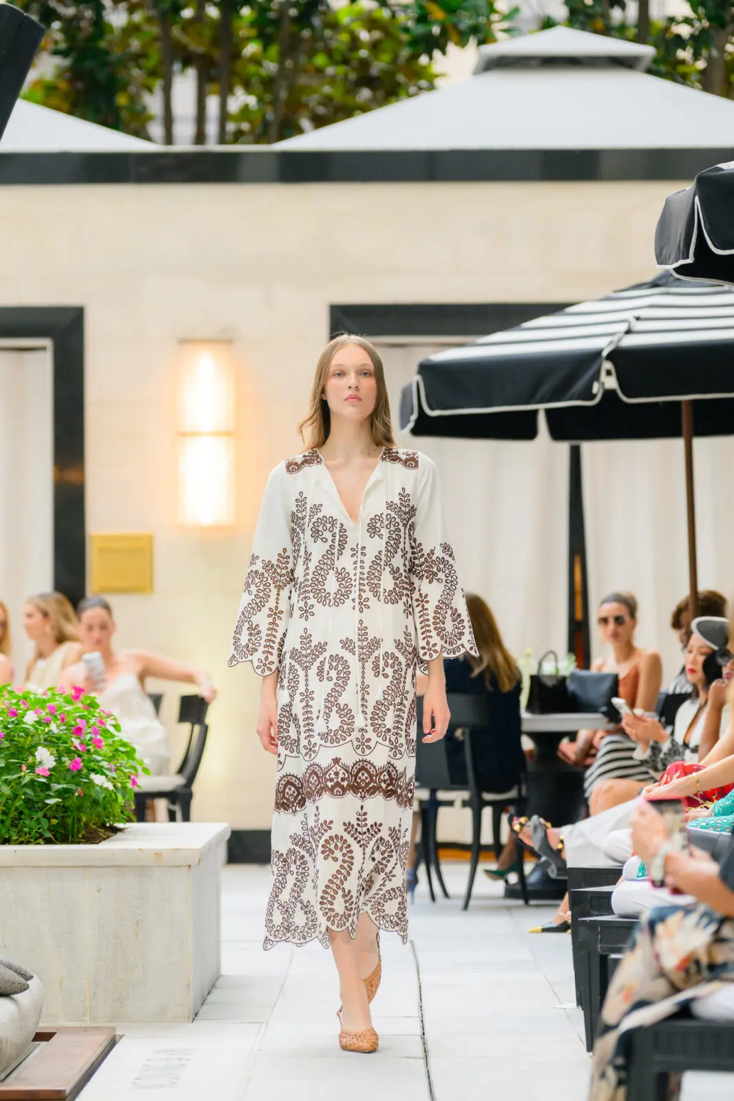 Kaftans are part of the Christy Lynn High Summer 2026 collection on display at the Post Oak Hotel. (Photo by Si Vo)