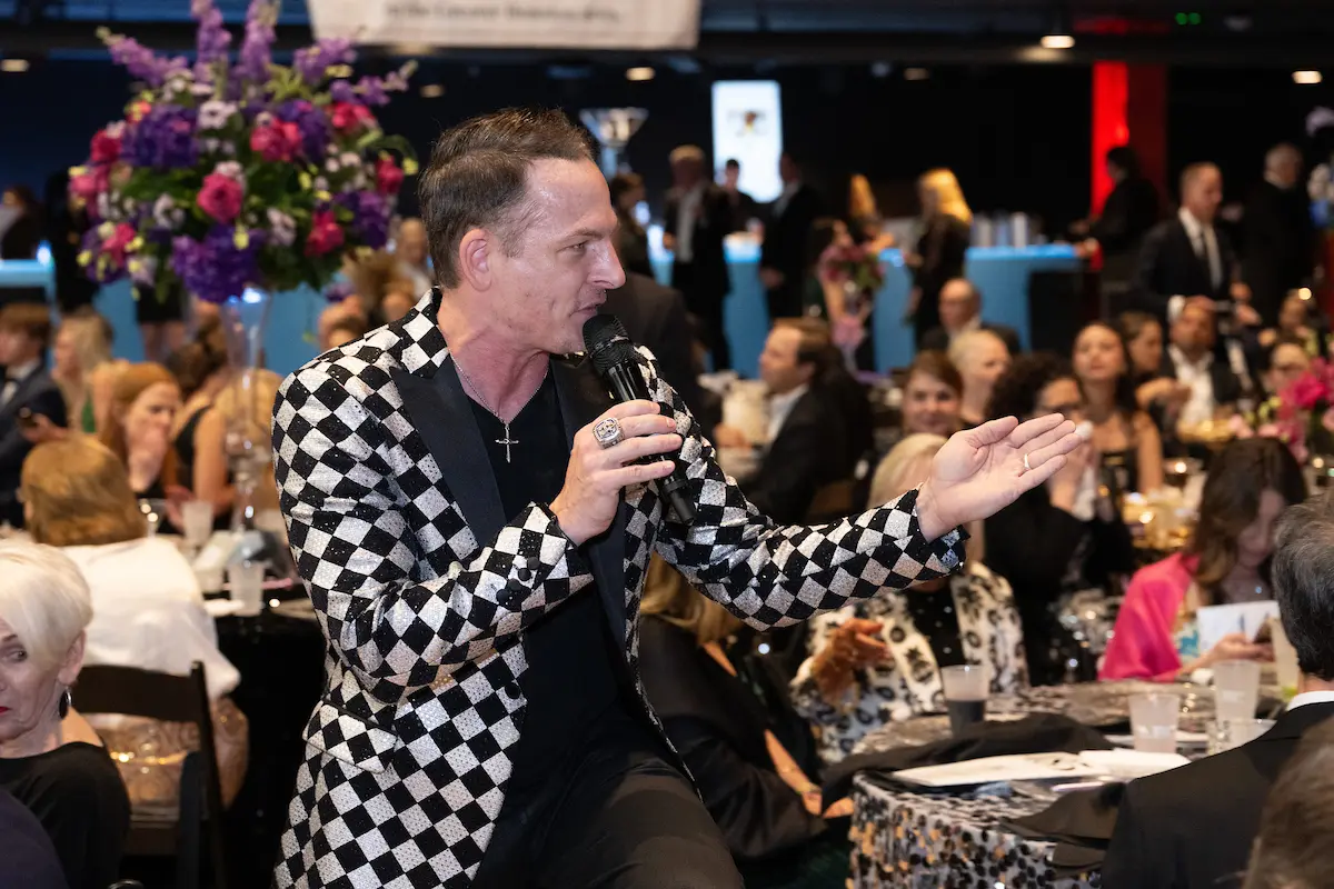 Auctioneer Johnny 'Bravo' Holloway at the Victory Houston gala (Photo by Wilson Parish_