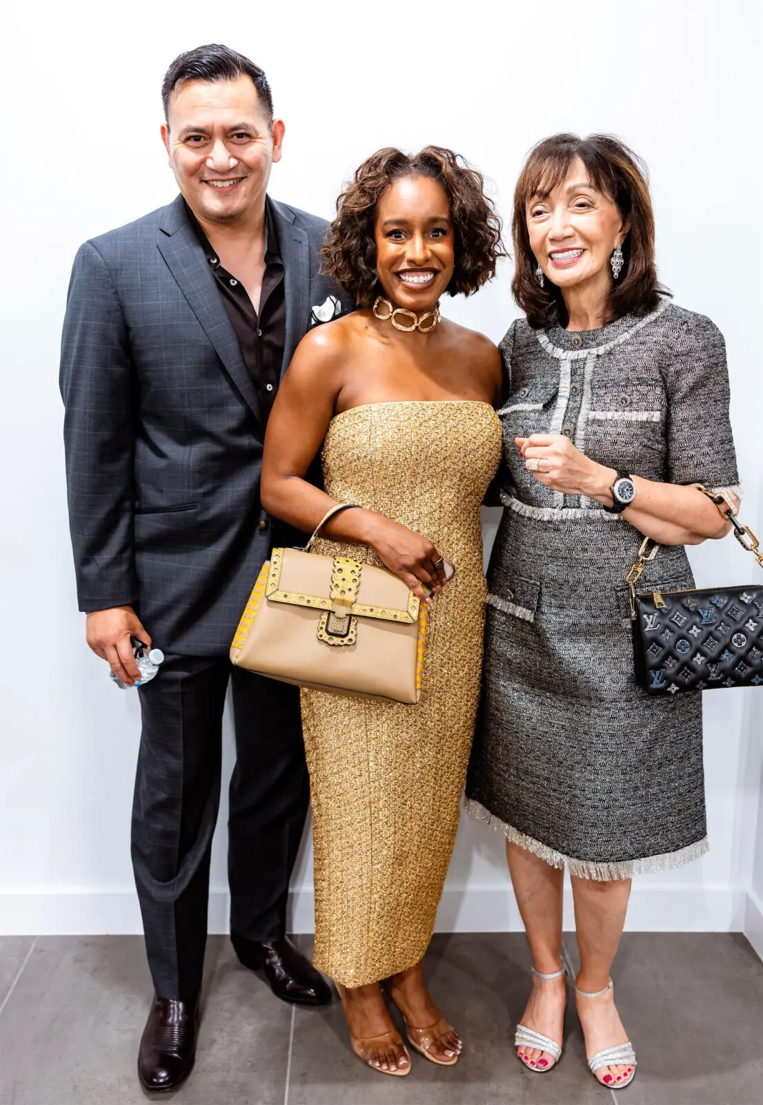 Derrick Mendoza, HAA CEO Taylor Jackson, Norma Mendoza at the Houston Arts Alliance Gilded & Golden Kickoff (Photo by Hung L. Truong)