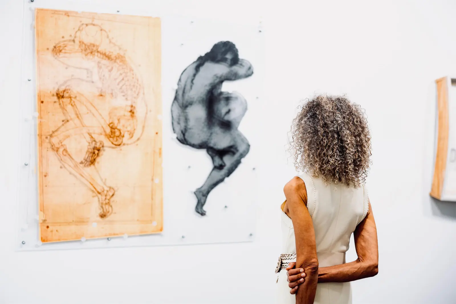 Dina Alsowayel takes in Mel Chin's "Living Score" at the Houston Arts Alliance Gilded & Golden Kickoff (Photo by Hung L. Truong) 