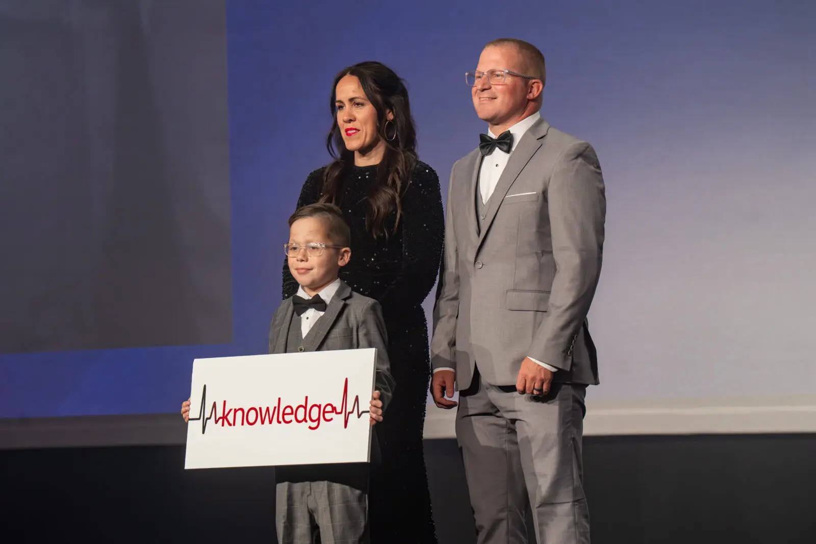 Heart Transplant Survivor Ridge Petersen with his parents, Katie and Tag Petersen. (Photo by See Pink, Inc)