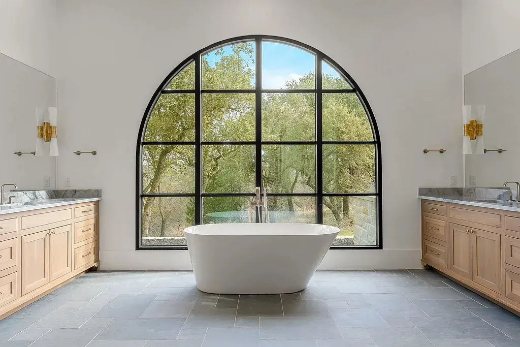 The spacious interiors are accented by modern chandeliers and upscale touches. (Courtesy)