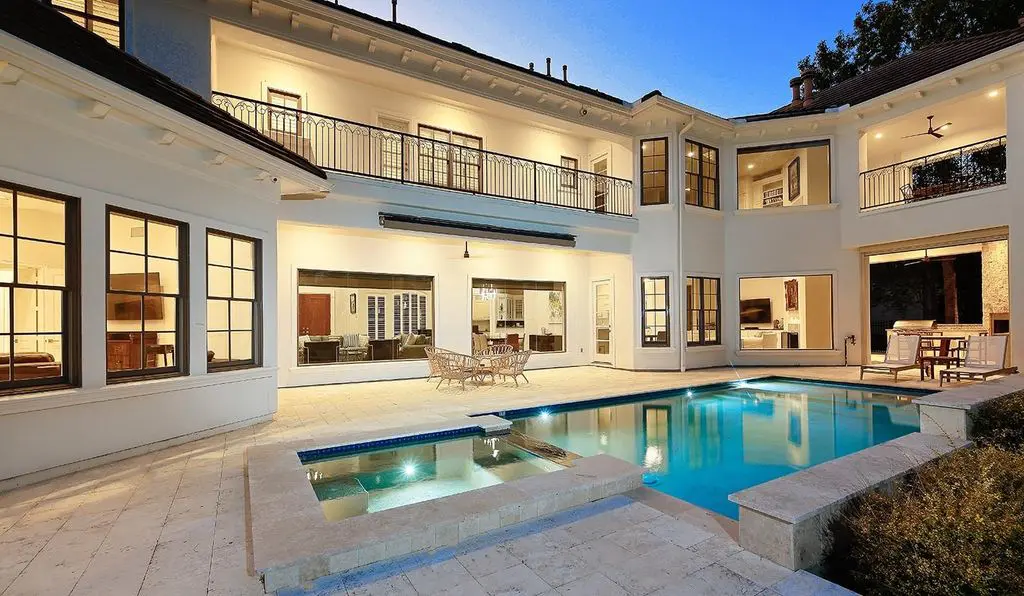The backyard pool at 10 Norlund Way has plenty of views of the course at Carlton Woods.