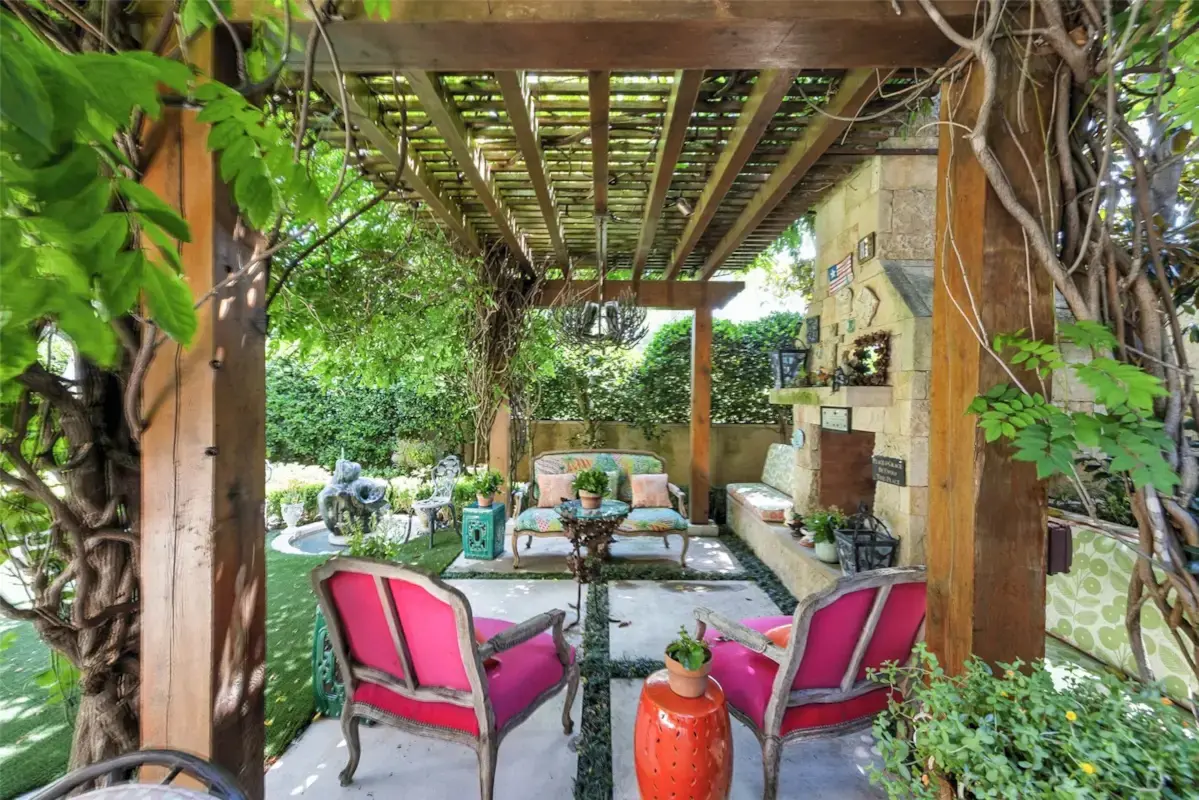 Vine-covered pergolas and intimate garden retreats create secluded spaces for relaxation and conversation. (Courtesy)