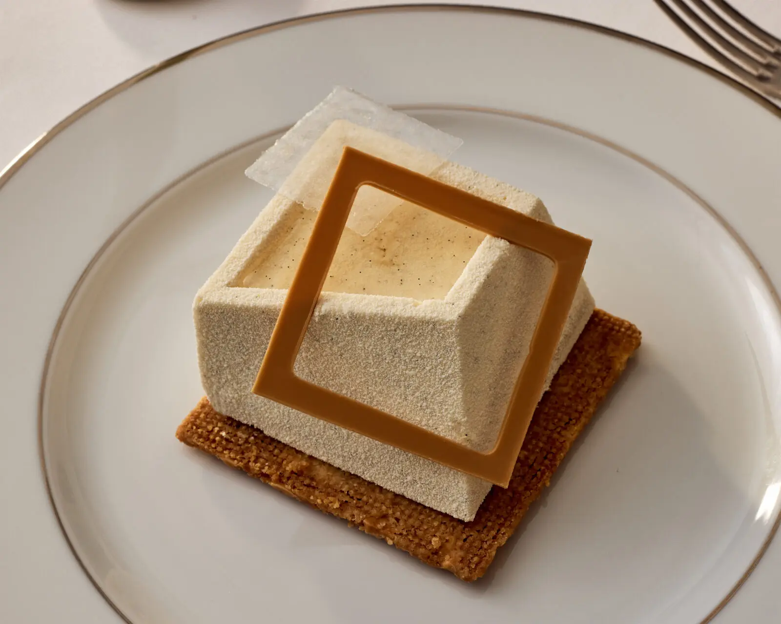 The Fenetre Marcel dessert, designed to mimic the Breuer building's iconic trapezoidal windows, is echoed here in layers of chocolate and almond croustillant. (Photo by Nico Schinco)