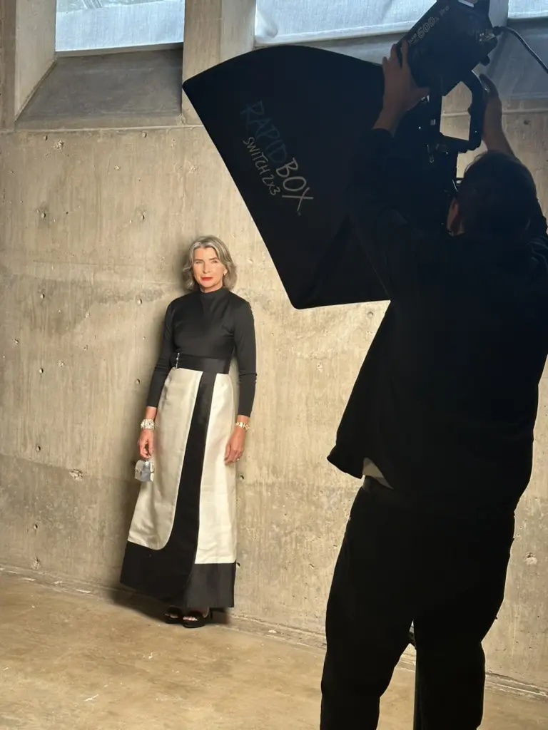 Ellecia Knolle, wearing a  1971 vintage gown from Neiman Marcus, poses for photographer Alejandro Salinas at the Houston Best Dressed shoot.