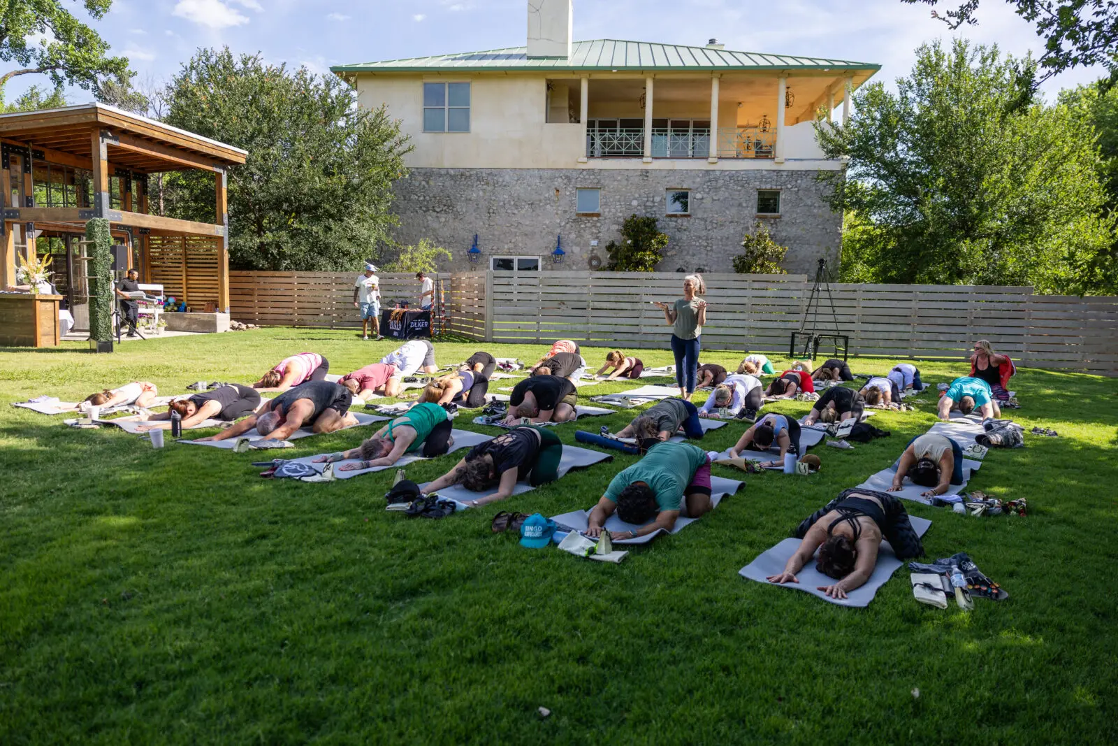 Morning yoga on the lawn offered a relaxed start to one day of the Range Rover House experience. (Photo by Land Rover Fort Worth)