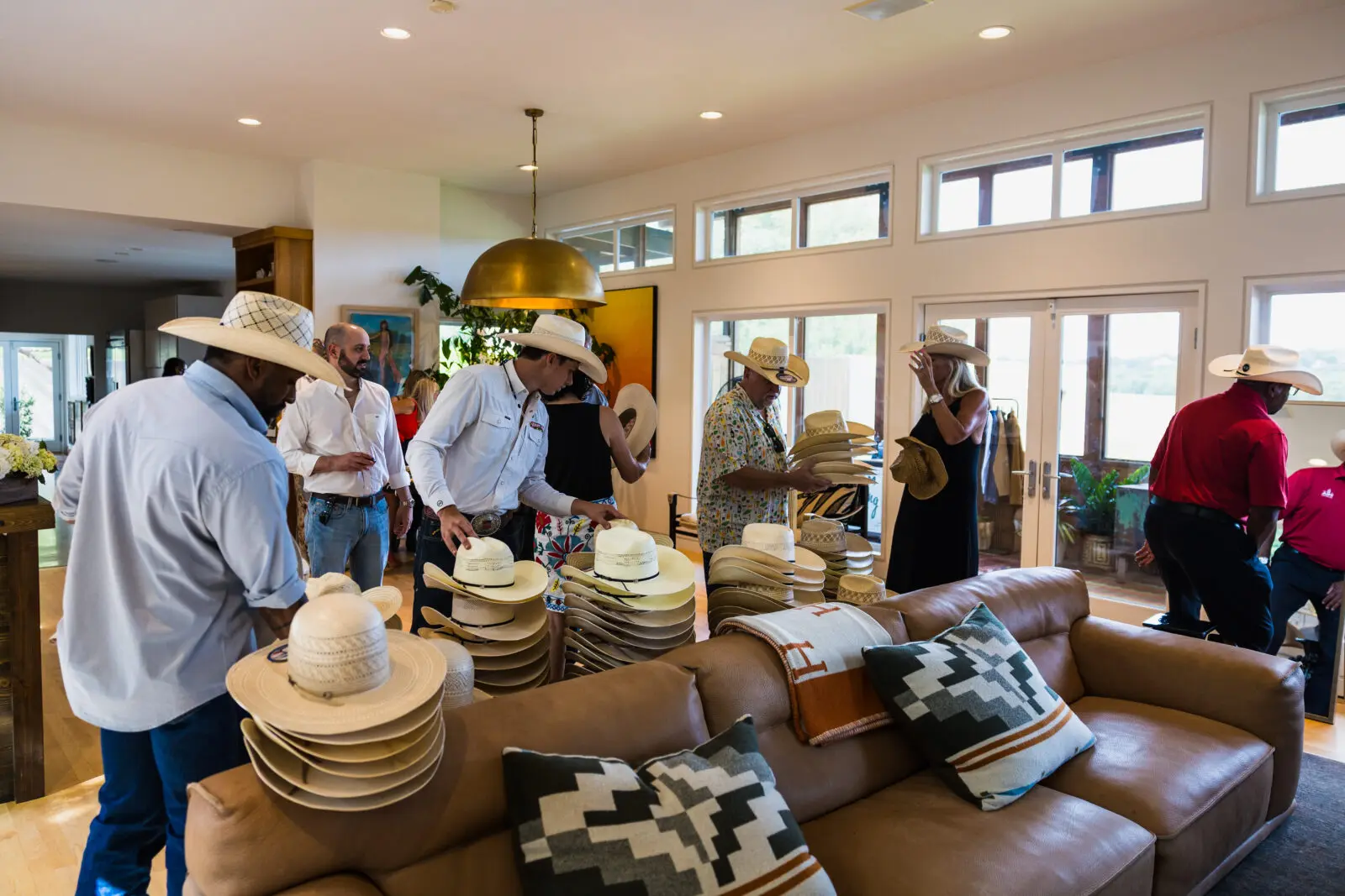 Guests selected custom cowboy hats during one of the weekend's themed activations. (Photo by Land Rover Fort Worth)