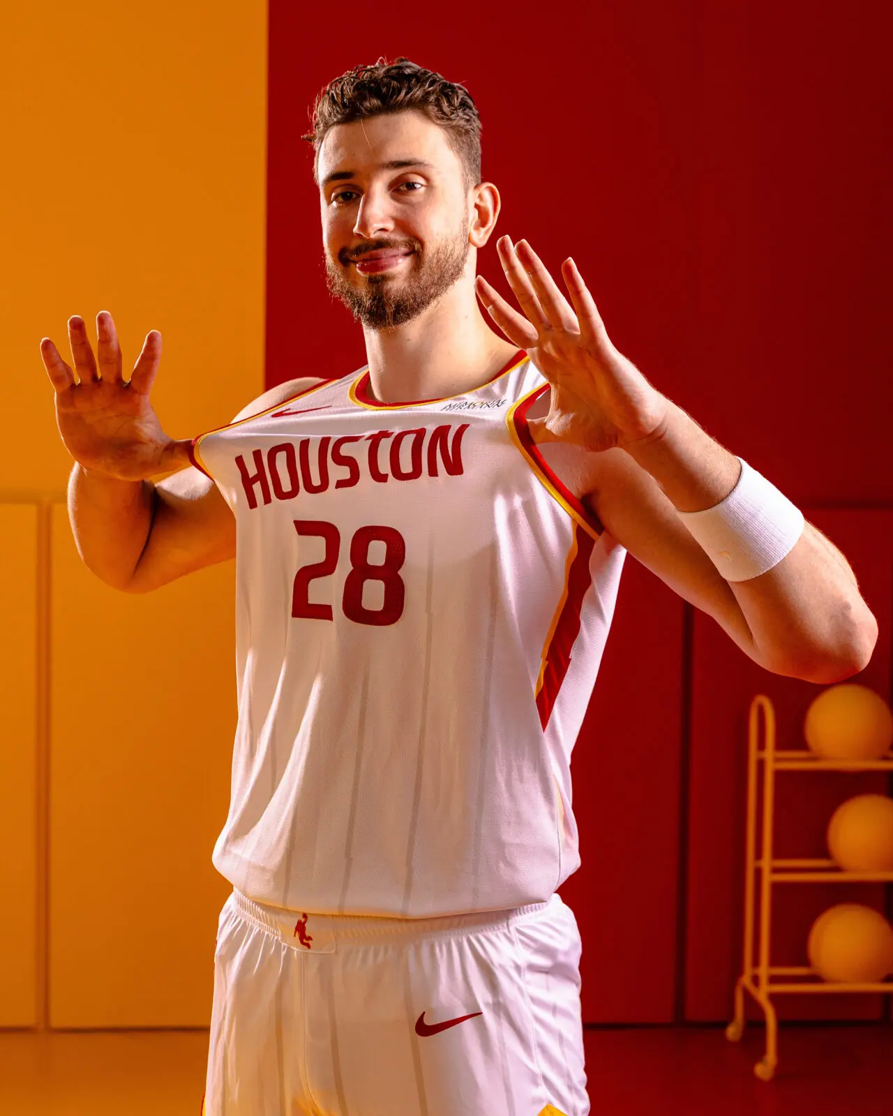 Alperen Şengün shows off the Houston Rockets' new white Association uniform.