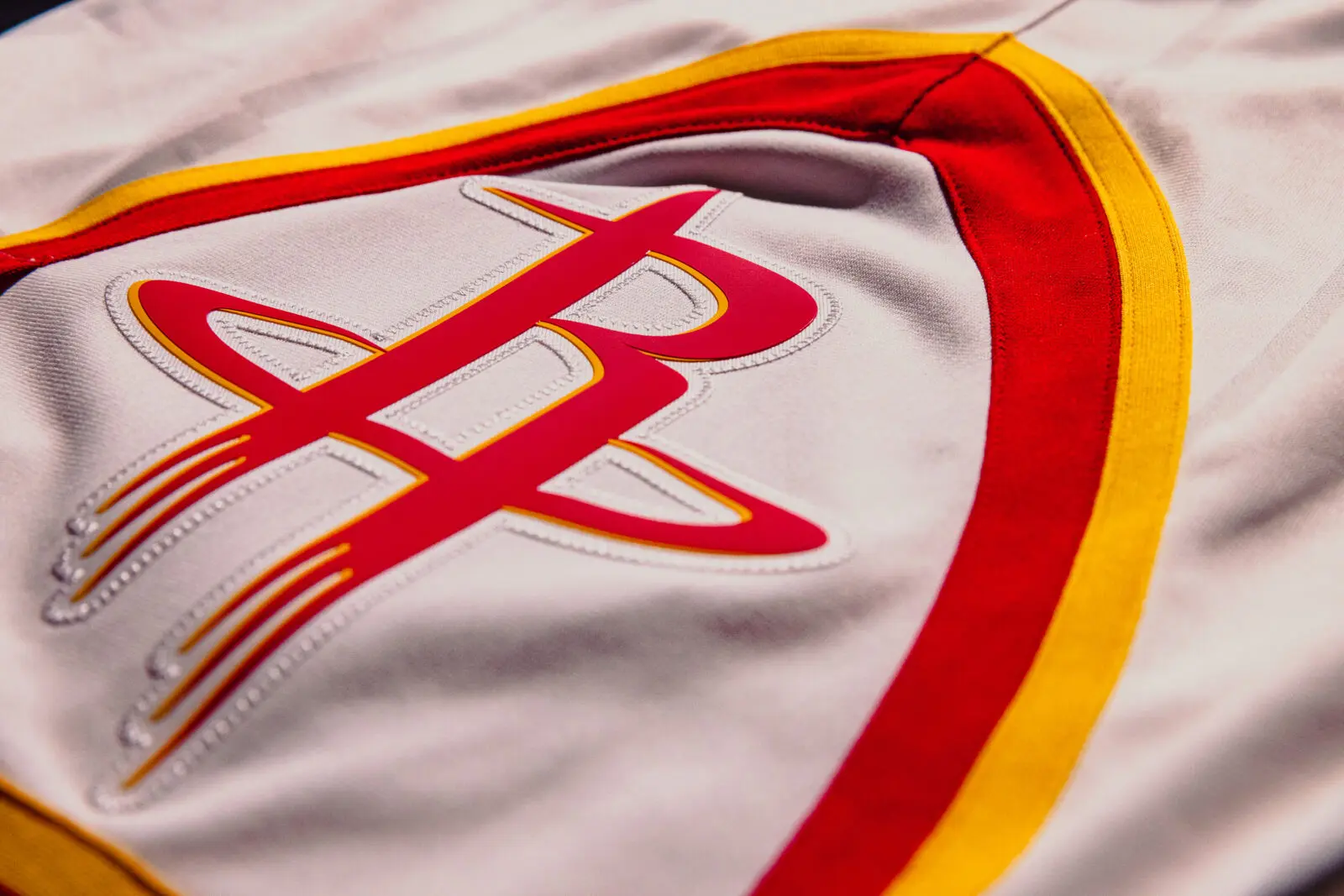 The Houston Rockets' new uniforms have the R featured prominently in an insert on the sides of the shorts.