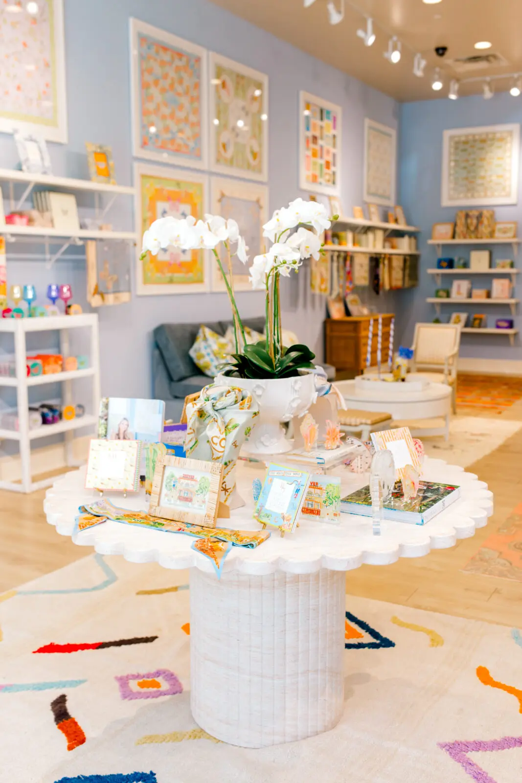 Pillows, scarves, acrylic artwork, stationery, and home décor showcase the breadth of Cartie's colorful product line, which has grown from a greeting card side project into a multistate brand. (Photo by Canon Sawyer)
