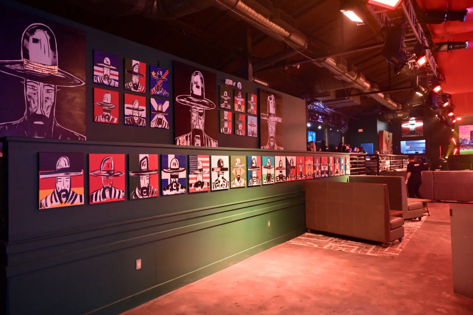 Artwork by Laura Goodson lines the walls of The Ranch Presents Pitch Live. (Photo by Alex Montoya) 