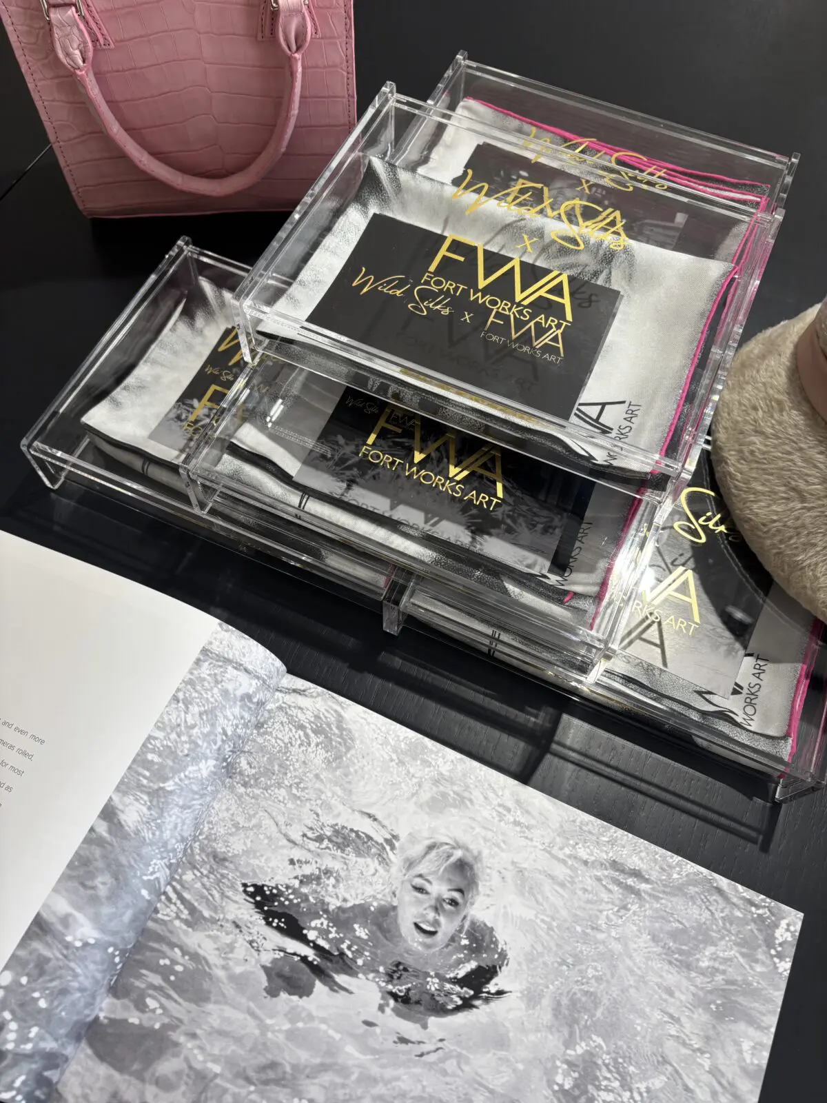 Wild Silks created a limited-edition silk scarf featuring Lawrence Schiller's photograph of Marilyn Monroe swimming during the filming of Something's Got to Give. (Courtesy)