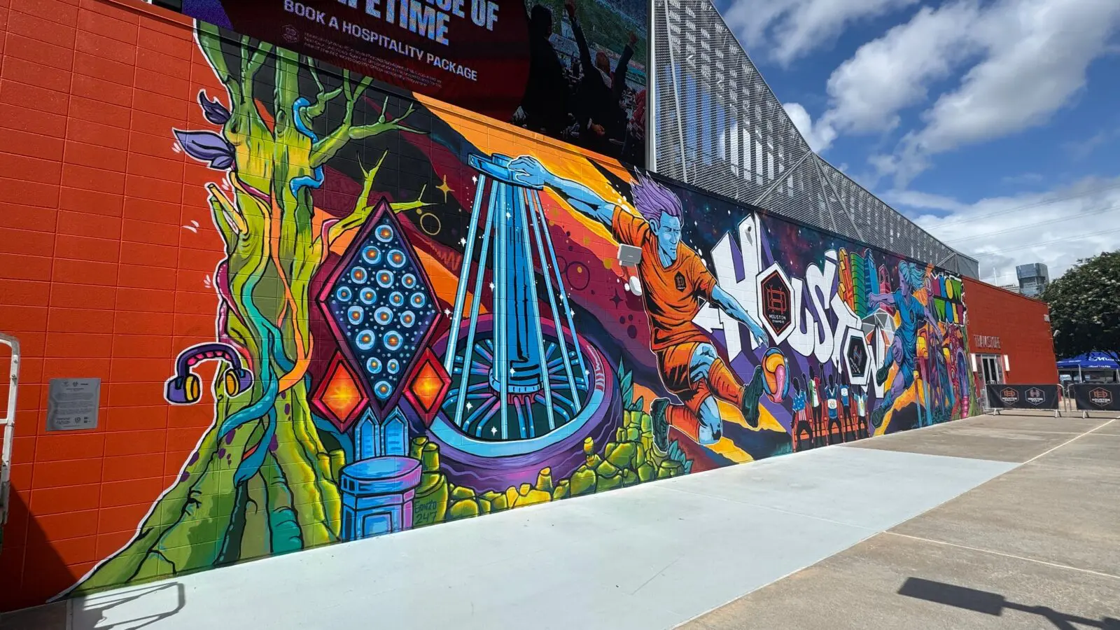 Houston art legend Gonzo247's mural, "Frequency of the City," 2026 was created in conjunction with Meow Wolf and Houston Dynamo FC. The mural is painted on the side of Shell Energy Stadium, where the Houston Dynamo and Houston Dash play. (Courtesy Gonzo247, Meow Wolf and Houston Dynamo FC)