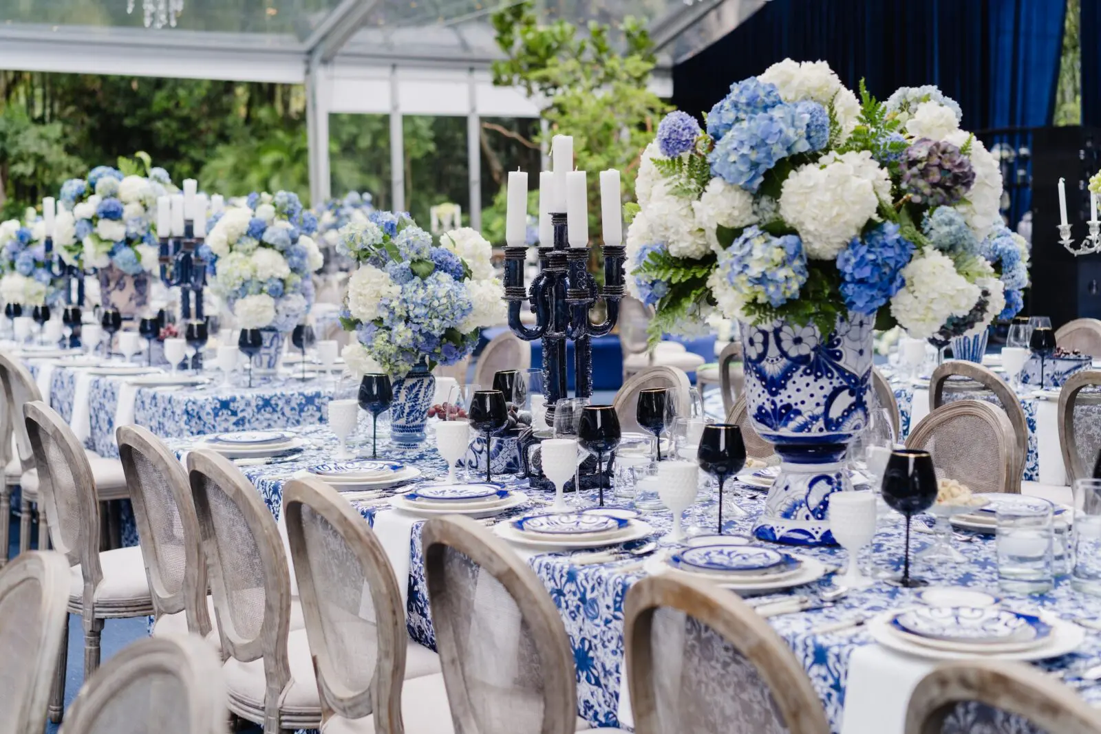 The blue and white theme of the Richardson/Taghdisi wedding included vast numbers of hydrangeas (Photo courtesy of Feronia)