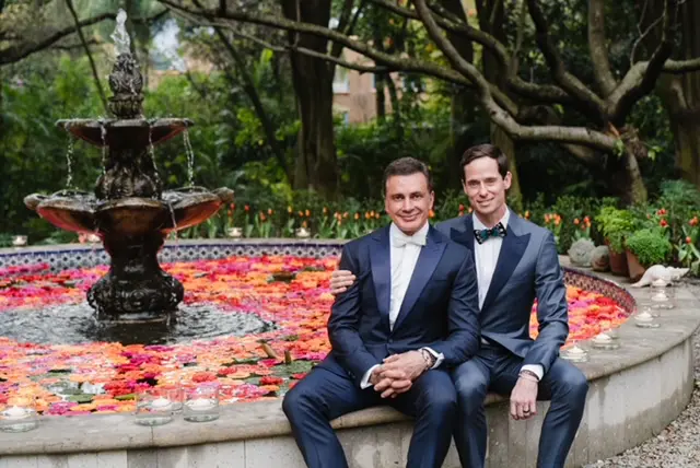 Monsour Taghdisi & Henry Richardson dressed for their wedding at Feronia in 2024 (Photo courtesy of Feronia)