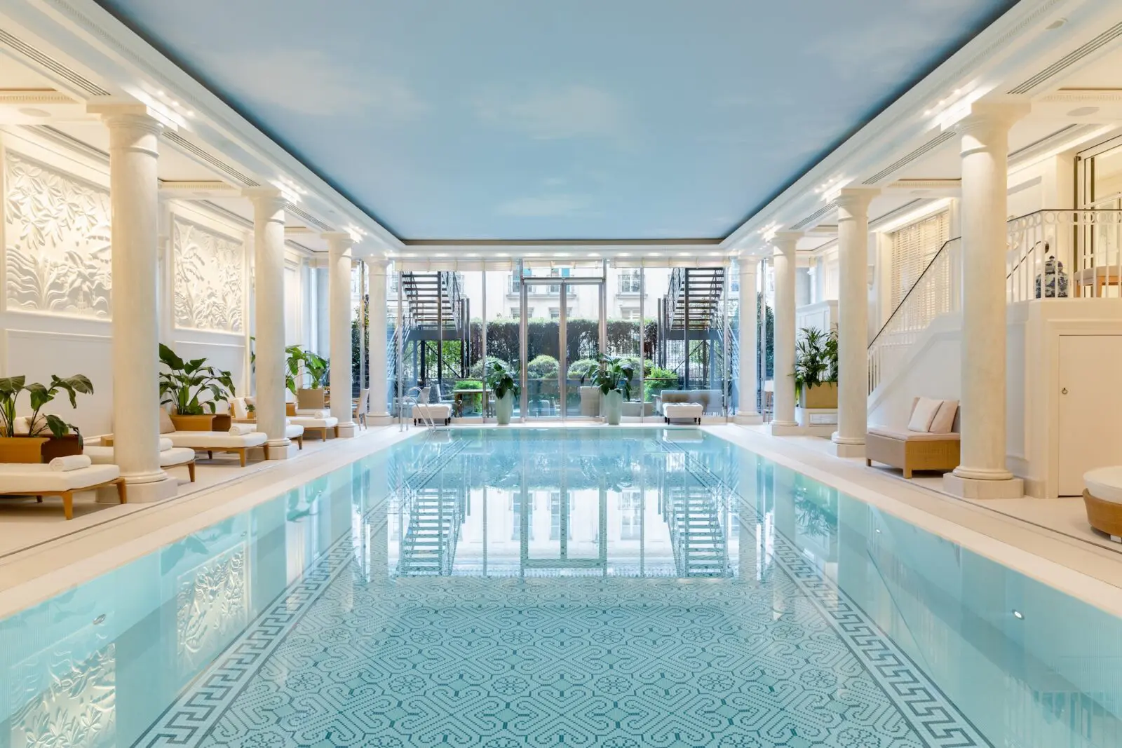 Chi, The Spa, partners with Aromatherapy Associates around an indoor pool lit by natural daylight.
