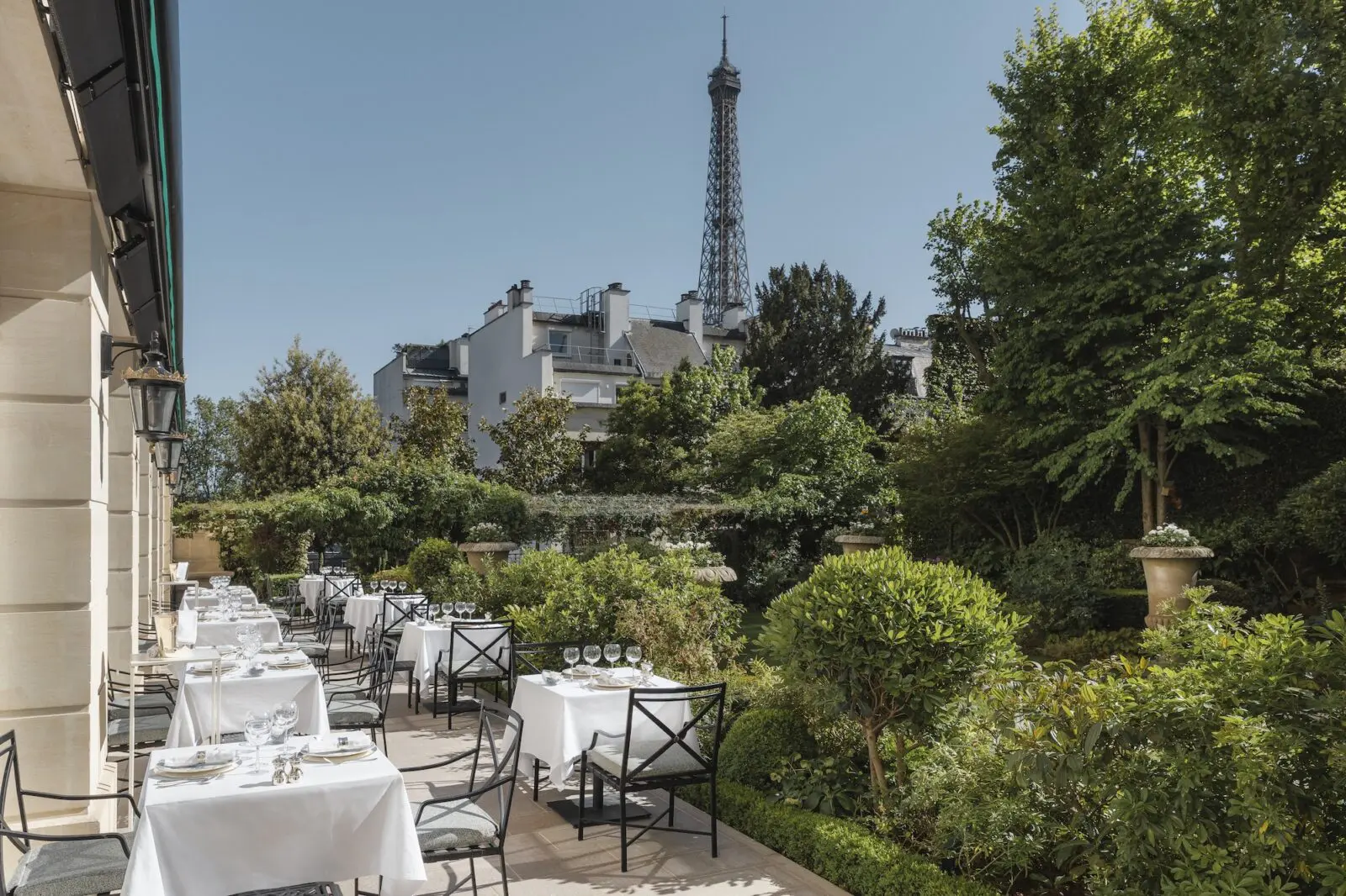 Dining in the hotel's private garden at Maison Roland, named for the prince promises classic French bistro fare.