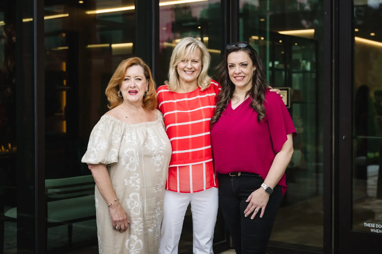 Suzie Williford, Chas Daniels and Amy Willis toured the outdoor spaces at 1 Riva Row. (Photo by Johnny Than)