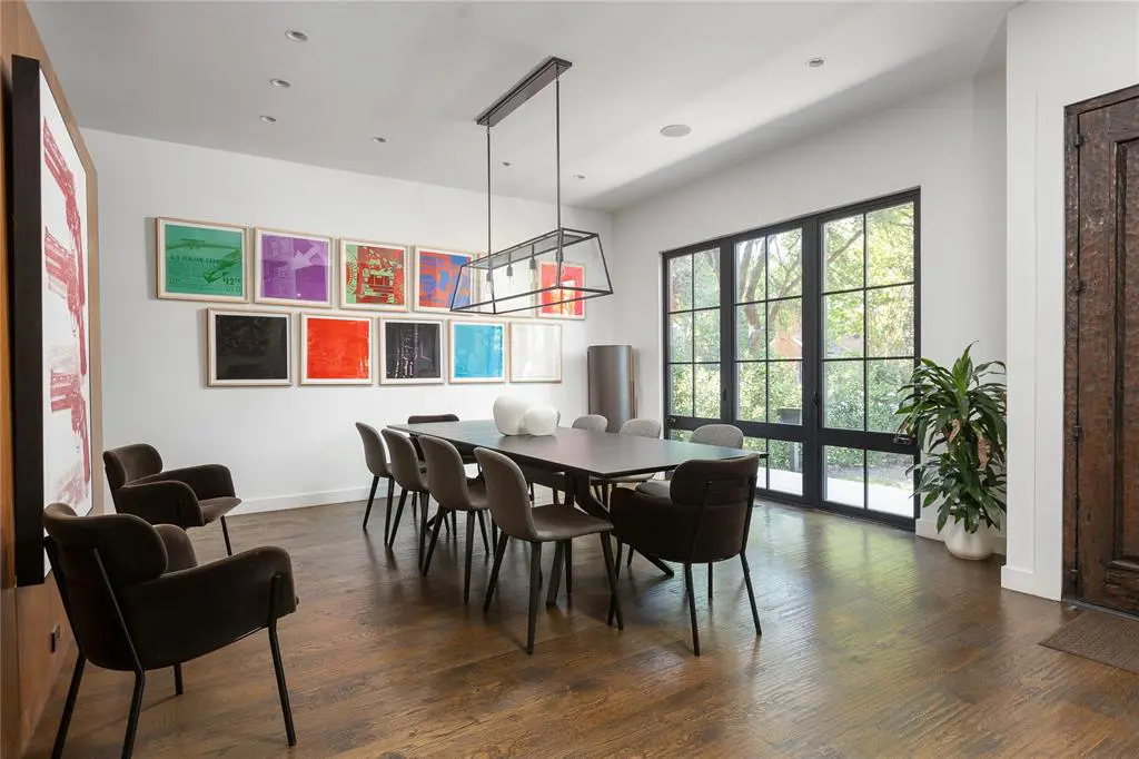 The white walls in the dining room provide the perfect backdrop for an art installation. (Photo by Compass RE Texas, LLC)