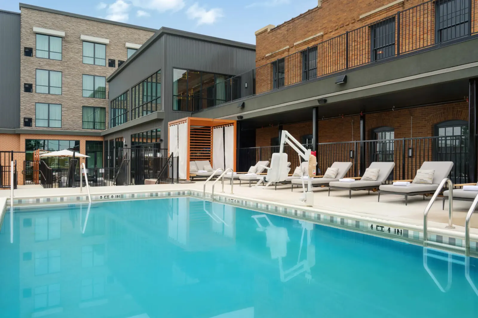 The only luxury hotel in Near Southside, The Nobleman offers a cozy outdoor pool with lounge chairs and poolside food and beverage service. (Courtesy