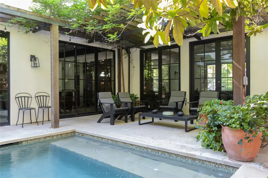 The sparkling pool in the backyard oasis (Photo by Compass RE Texas, LLC)