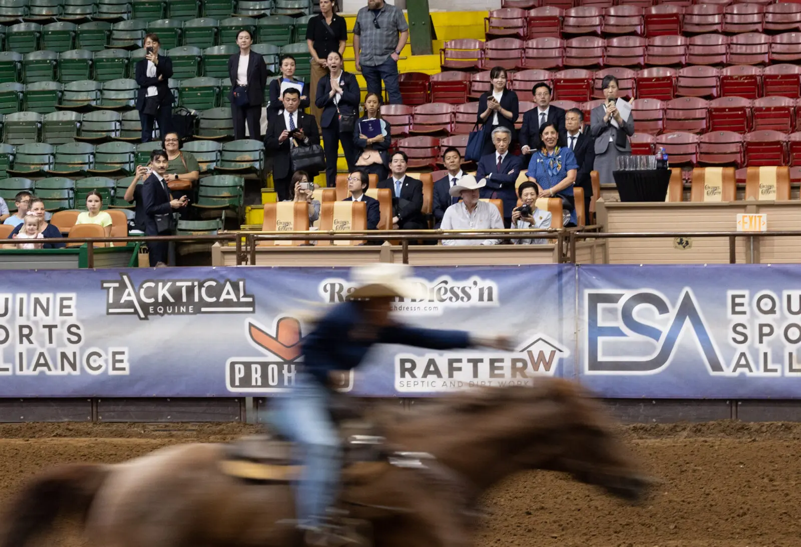 Princess Takamado watches her first rodeo at Cowtown Coliseum during her Fort Worth visit. (Photograph by Brooks Burris for Visit Fort Worth)