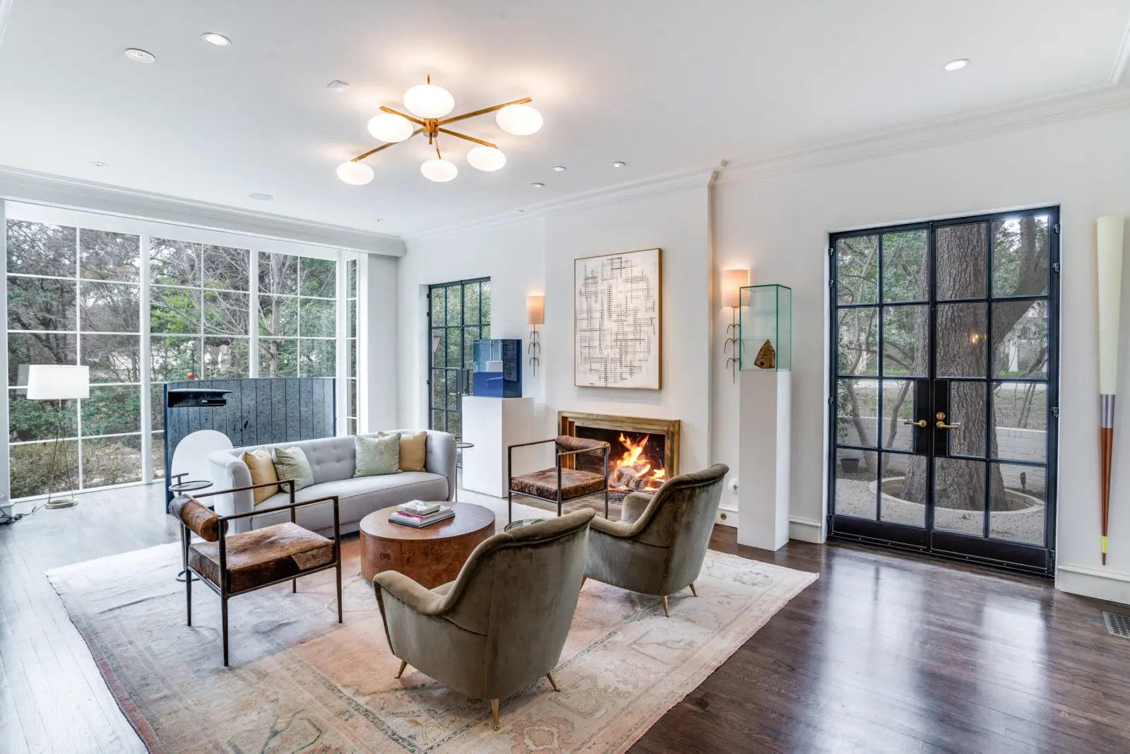 Living room with French doors (Photo by Allie Beth Allman & Associates)