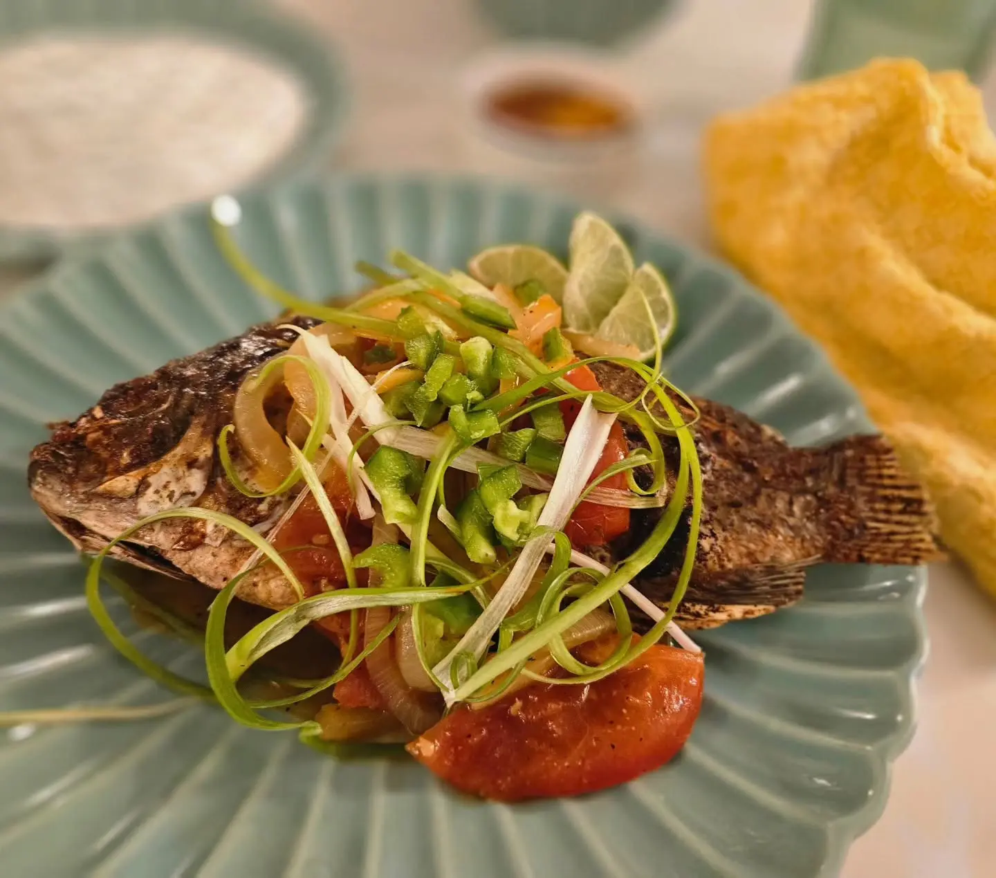 Ca Sot Ca, a whole fried garlic and lemongrass fish topped with a rich, spicy tomato sauce, will be among the signature dishes on the menu at Duong DeVille. (Courtesy)