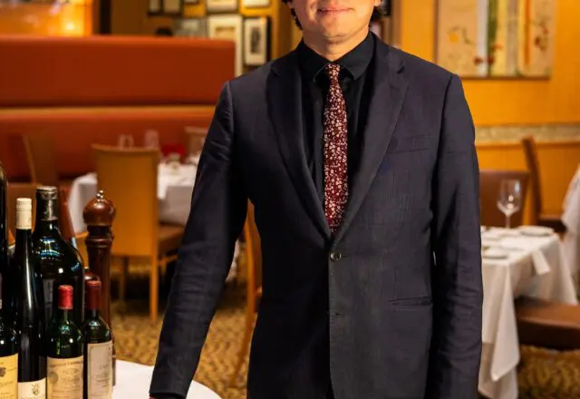 Carlos Luján is the man to see when ordering a bottle at Tony's. (Caroline LeGates)