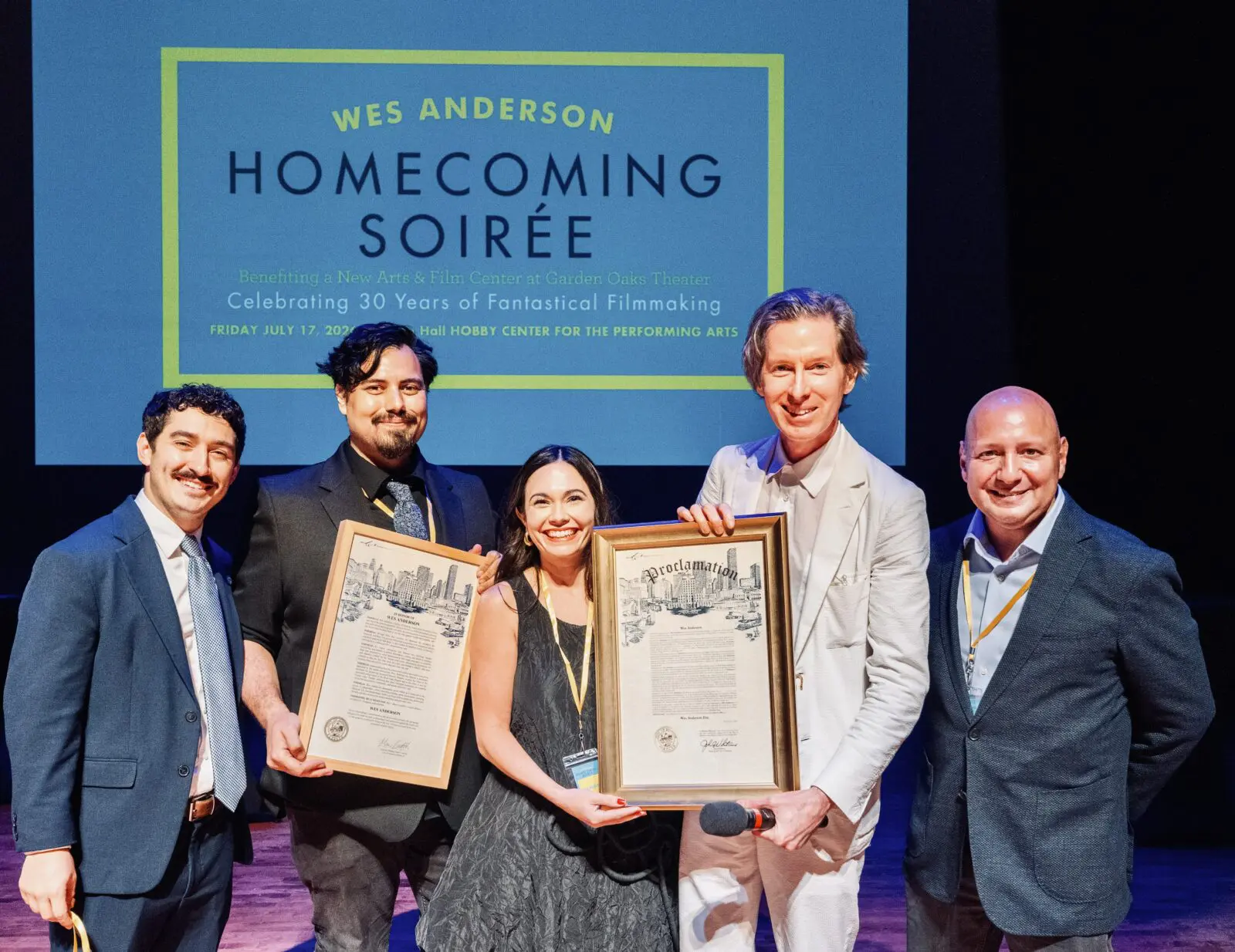 Proclamation Day: Wes Anderson Day is officially designated as July 17, 2026. Shown from left: City of Houston Councilmember Joe Panzarella, Thomas Wheaton from Councilmember Mario Castillo's Office, City of Houston Director of the Office of Arts Michele Leal, honoree Wes Anderson, and Houston Film Commission VP / Executive Director Alfred Cervantes. (Photo by Alan Nguyen)