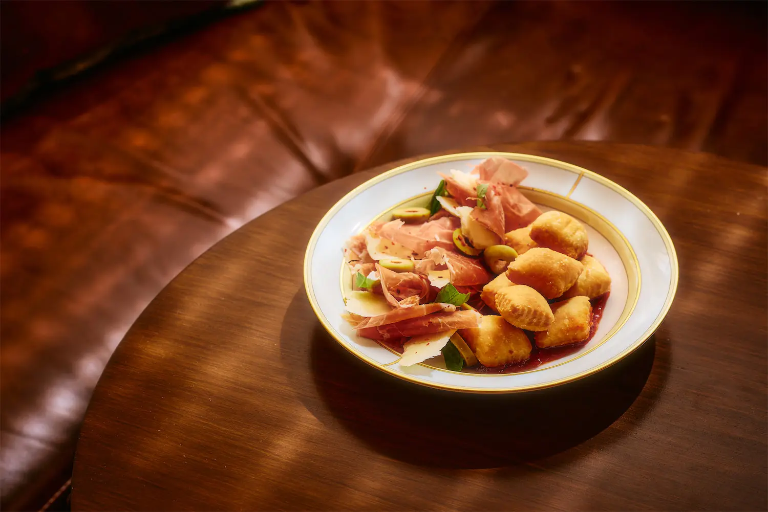 Start with the Gnocco Fritto with prosciutto and tomato jam at Scilla. (Photo by Chase Hall)