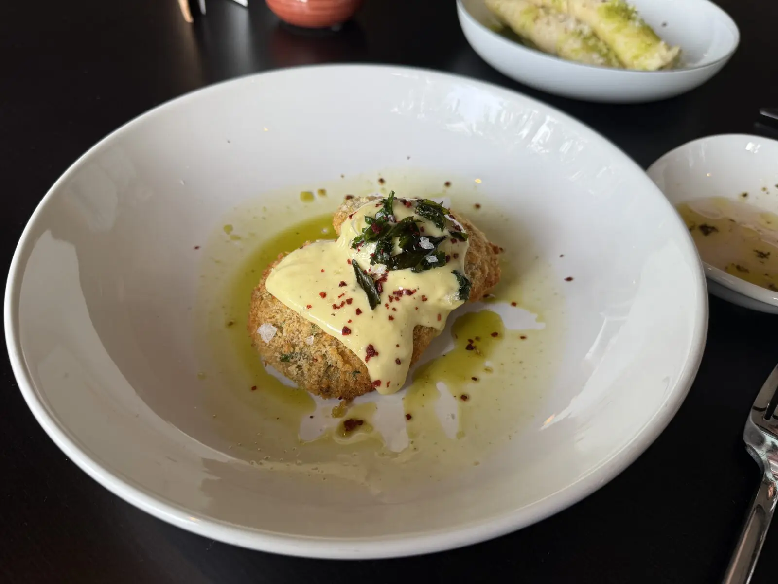 Always start with the crab cakes at Trattoria Bugatti. (Photo by Megan Ziots)