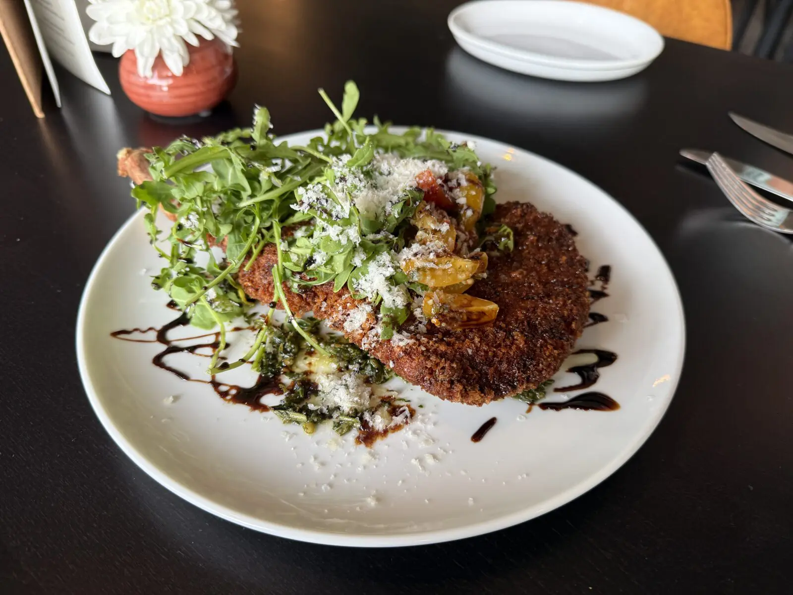 At Trattoria Bugatti, the pork Milanese is an absolute stunner. (Photo by Megan Ziots)