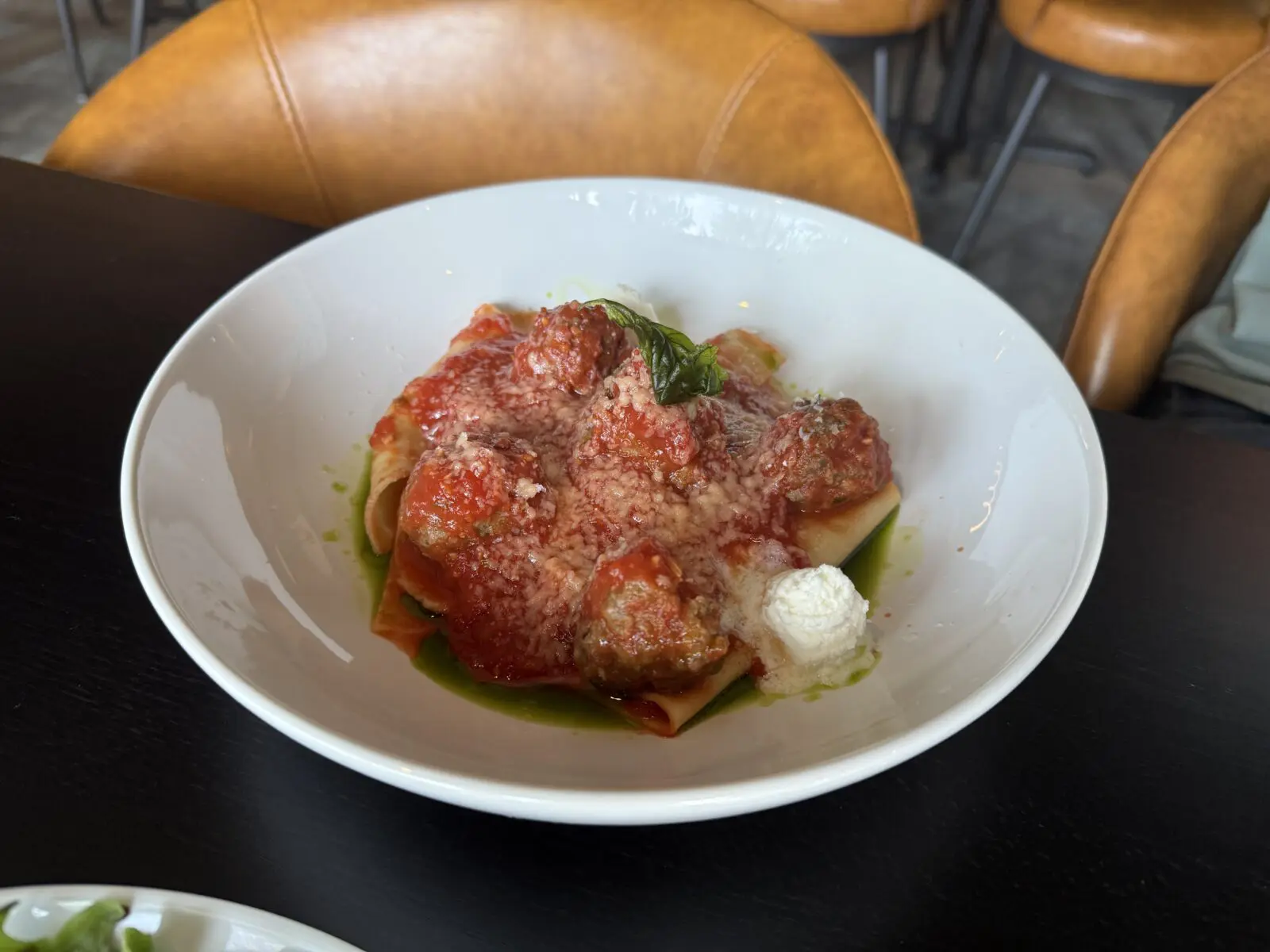 The Lasagna “Rotta” is Chef Erin Willis’ modern take on lasagna with housemade meatballs, ricotta, pecorino, and broken sheet noodles. (Photo by Megan Ziots)