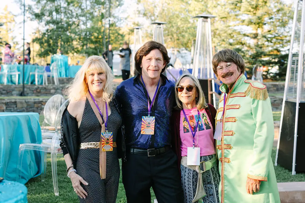 Alison Finlay, Jay Sears, Julie & John Gilbert at the rock concert-themed birthday party. (Photo by Sparkle Photography)