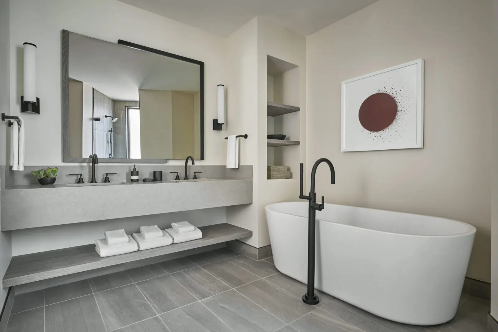 A free-standing tub in the spacious en-suite bathroom of a residence  (Photo by Pendry Park City)