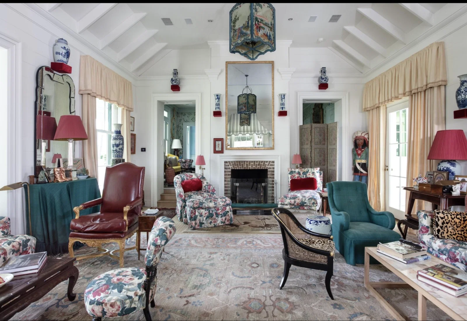 The living room in the main house at  Goodthyme Farm  features an elevated ceiling and wood burning fireplace (Photo by Kerry Kirk Photography)