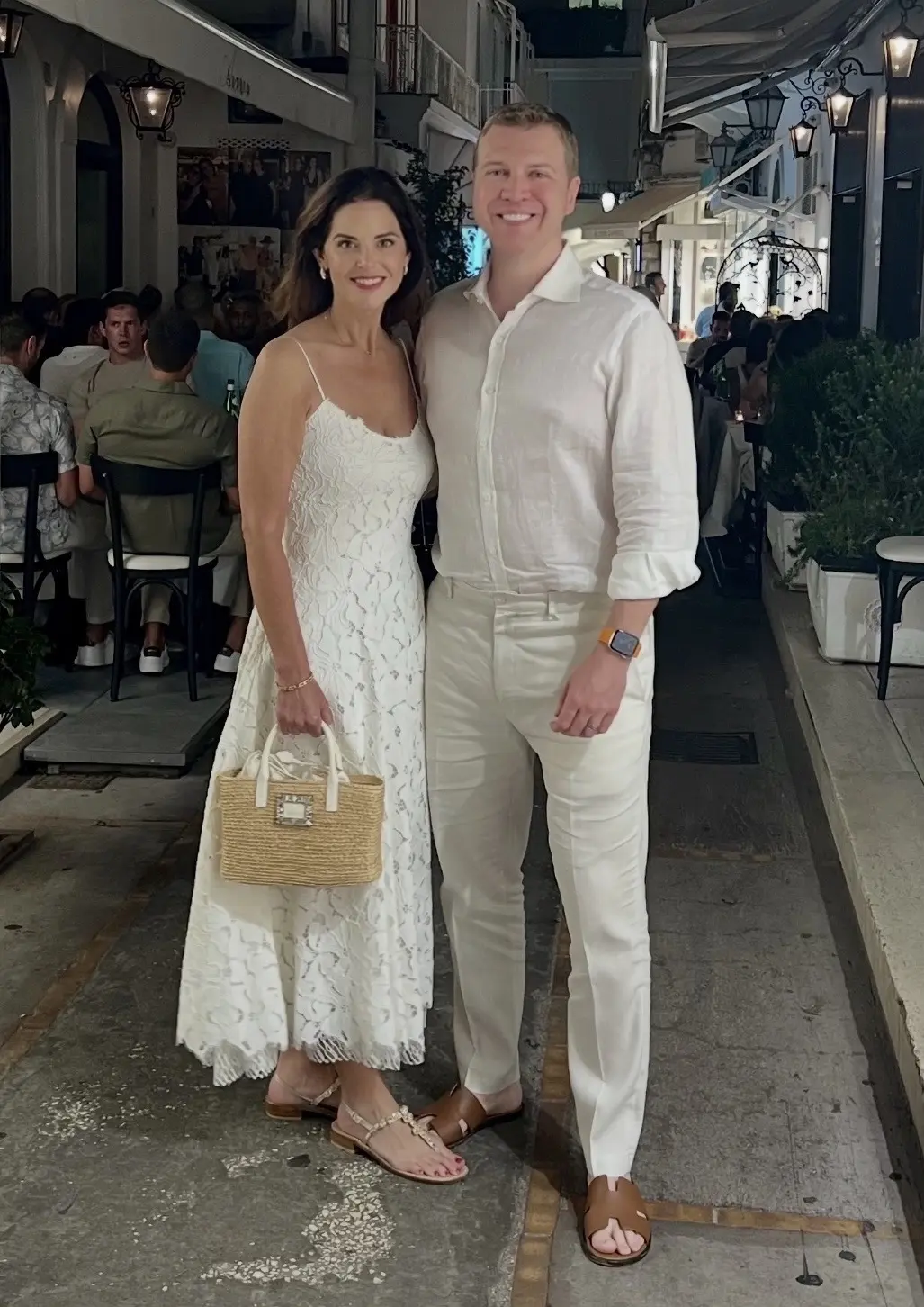 Ann & Jonathan Ayre attending an all white dinner in Capri in August of 2025