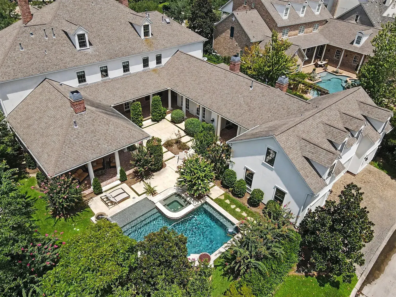 The expansive backyard at 19 Cape Harbour Place is perfect for hosting.