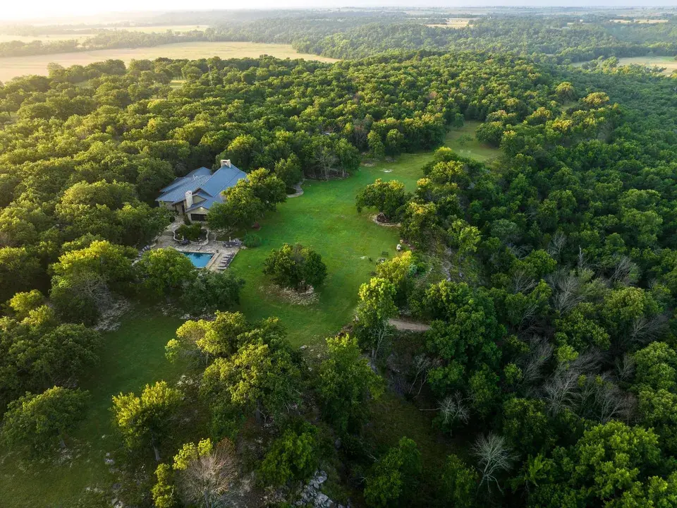 The sprawling Rolling R Ranch features native prairie, hardwood forests, pastureland, and more than 2.5 miles of Clear Creek. (Photo by Hortenstine Ranch Company)