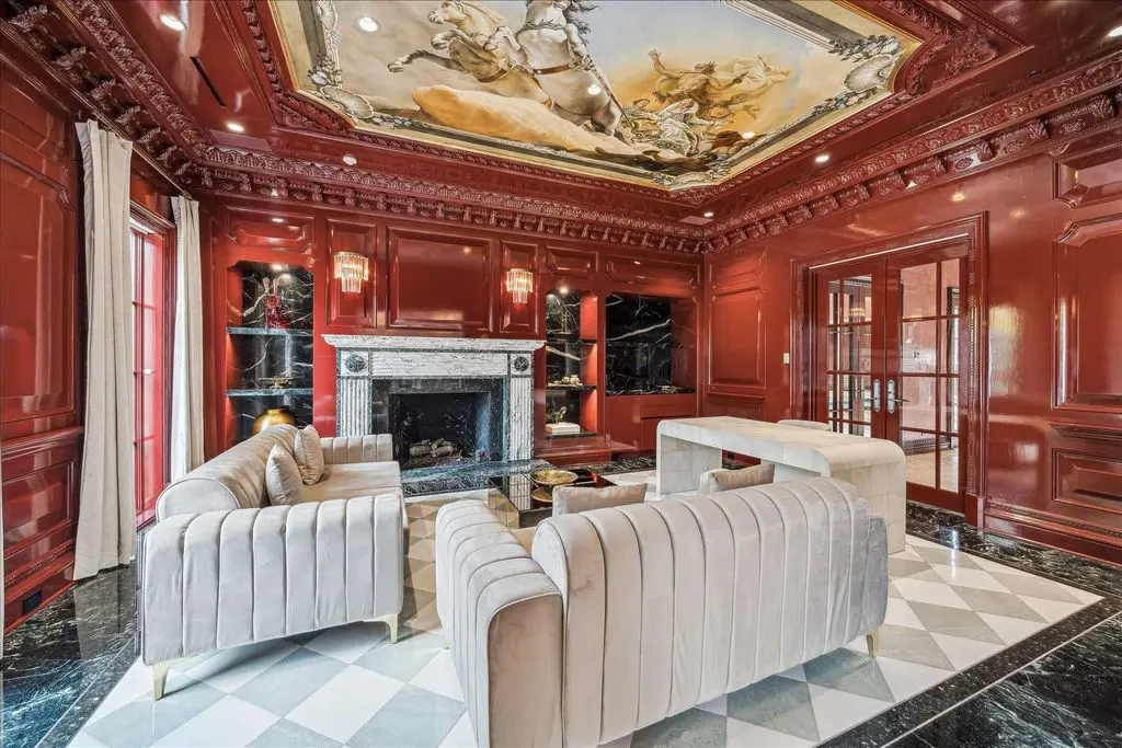 The hand-painted ceiling in a sitting reoom in the grand home at 1708 River Oaks Boulevard