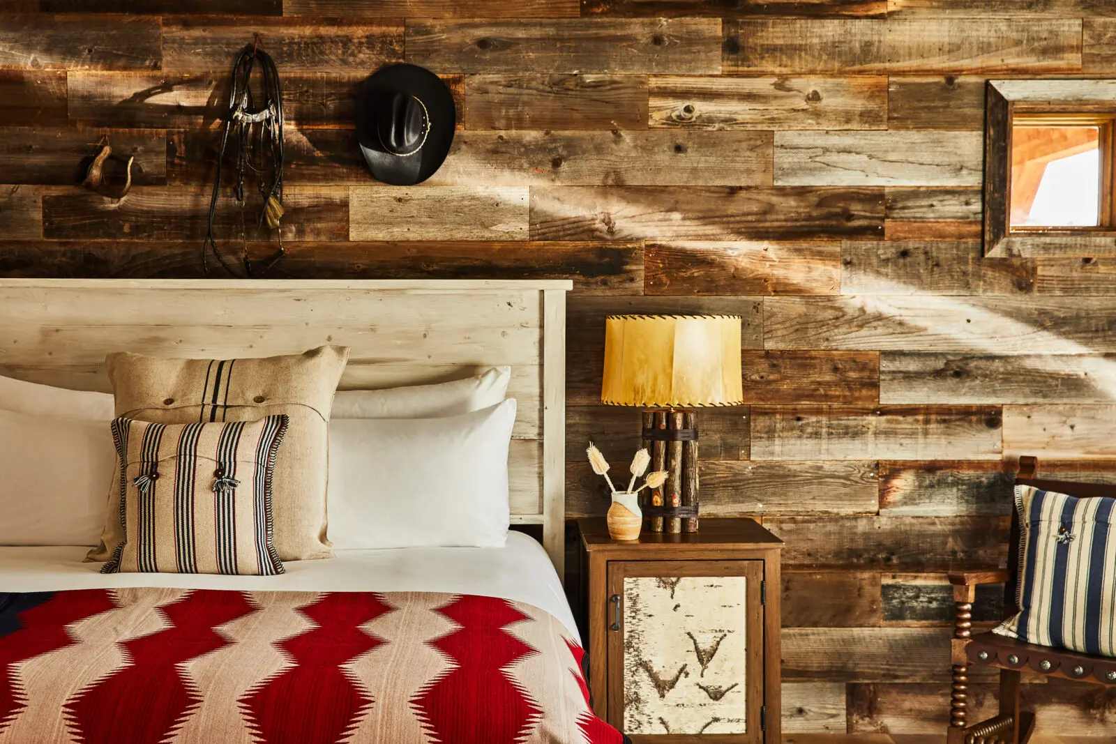 The rooms capture the essence of New Mexico, with Navajo-inspired textiles and a traditional kiva fireplace that lights with the flip of a switch. (Photo by Auberge Collection)
