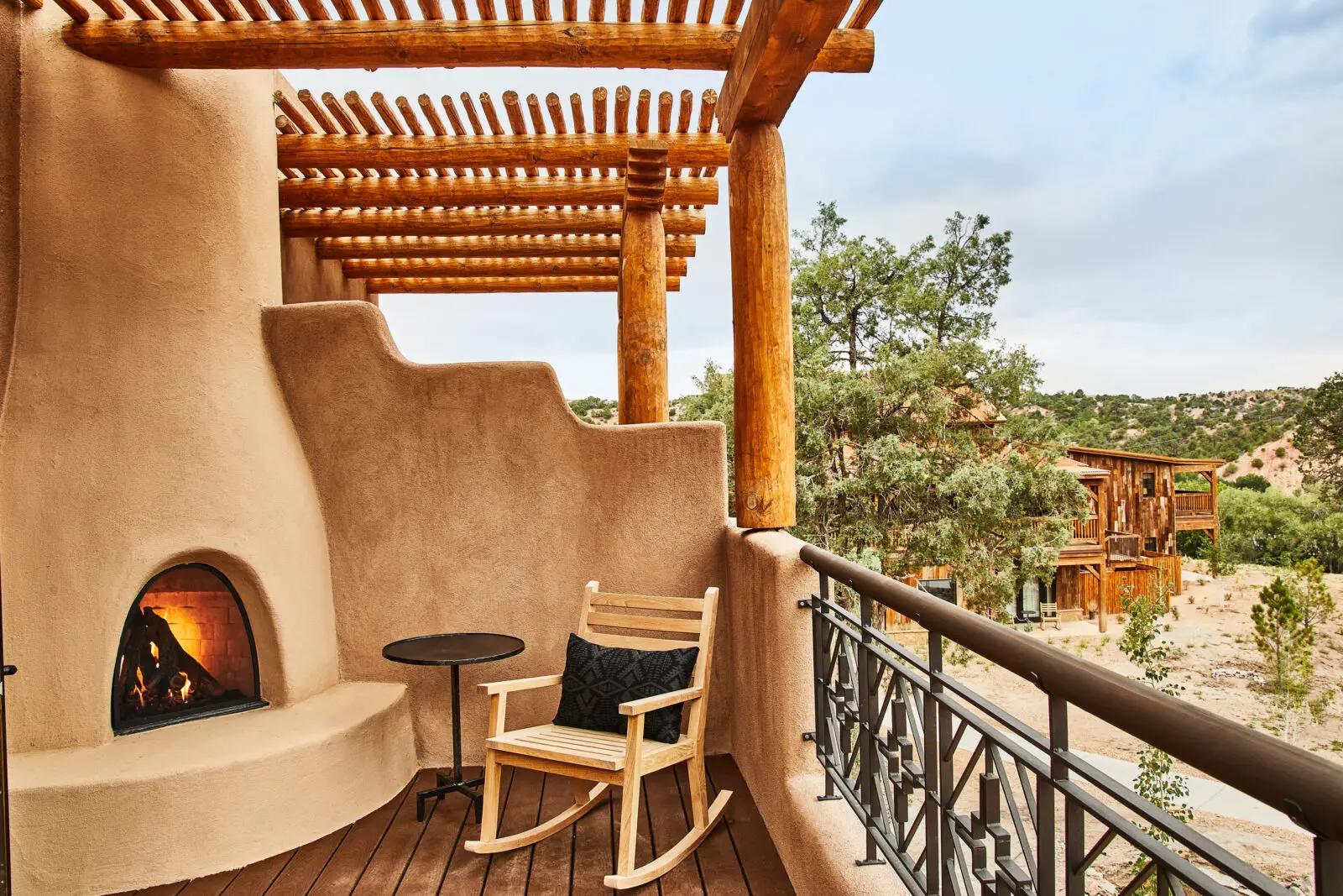 A three-bedroom casita at Bishop's Lodge with a private balcony and outdoor fireplace (Photo by Auberge Collection)