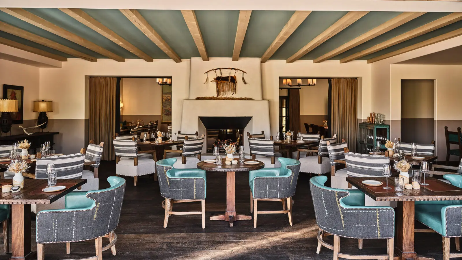 Whether in a handcrafted Mezcal cocktail at The Bar or in the scent of the piñon wood logs burning in the main dining room, fire informs the multi-sensory experience at SkyFire. (Photo by Auberge Collection)