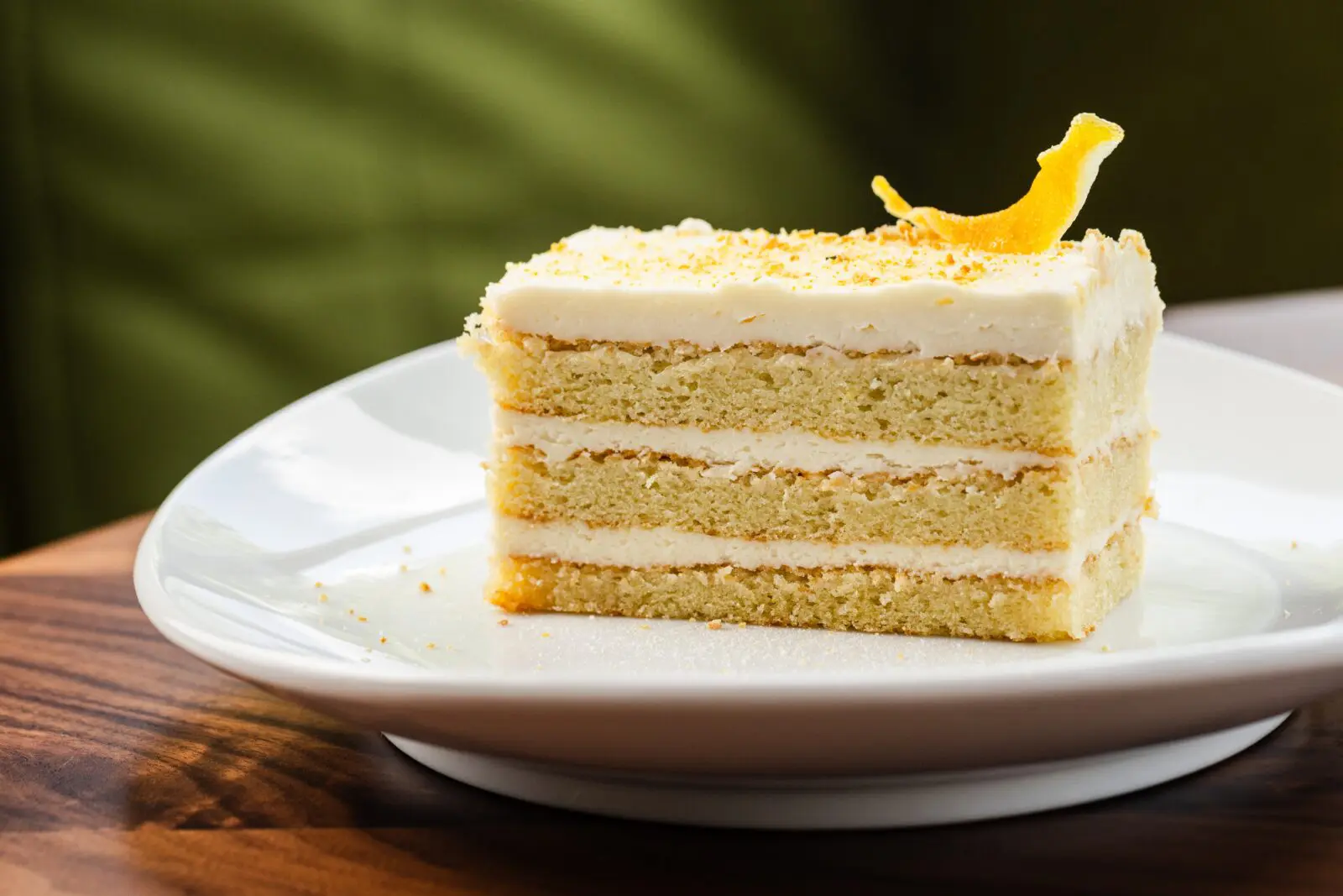 Dessert options include this simple lemon-tinged olive oil cake with a goat cheese icing. (Photo by Becca Wright)